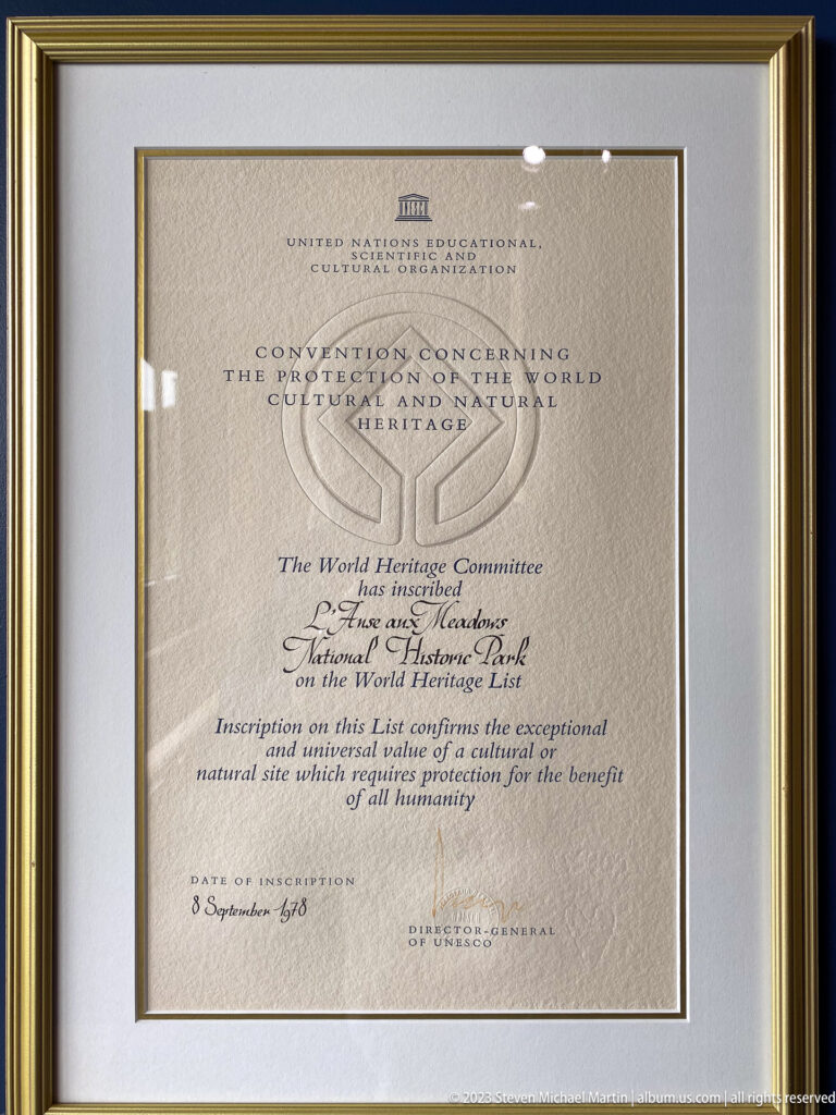 Framed English UNESCO World Heritage certificate for L’Anse aux Meadows, bearing the World Heritage emblem and formal inscription text.