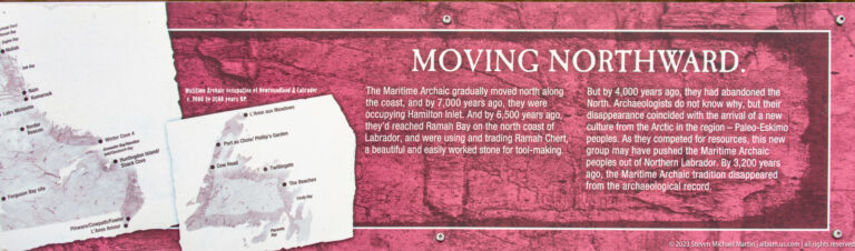 Red 'Moving Northward' interpretive panel with regional maps showing archaeological locations along the coast.