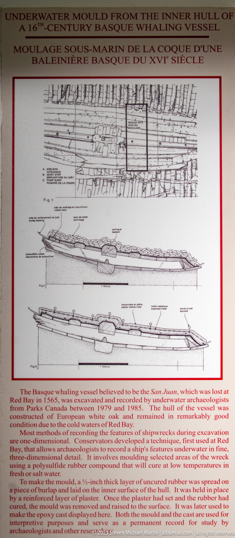 Detailed historical or reconstructed ship profile drawing with hull framing and explanatory text in a museum display.