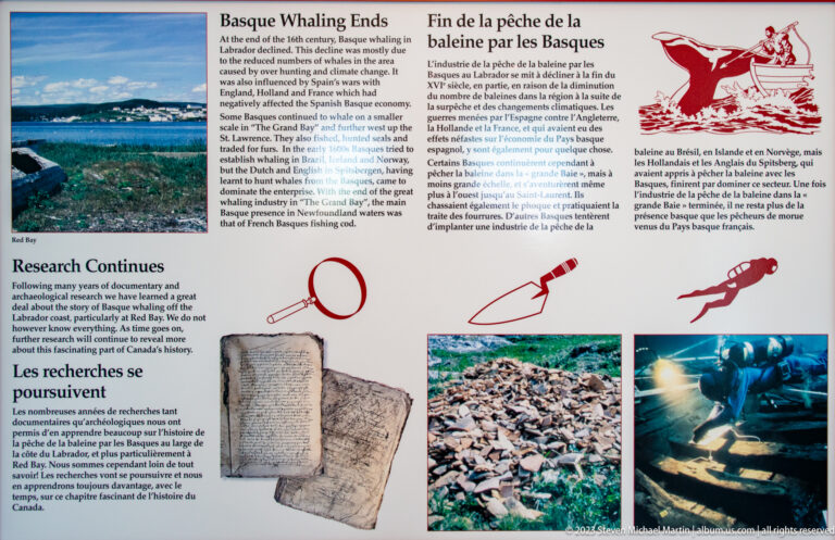 Bilingual panel with headings 'Basque Whaling Ends' and 'Research Continues,' plus documents, excavation photographs, and diver imagery.