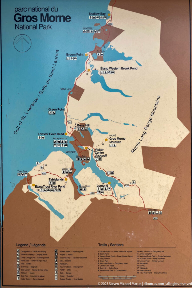 Printed Gros Morne National Park orientation map showing coastline, roads, waterways, settlements, and visitor facilities.