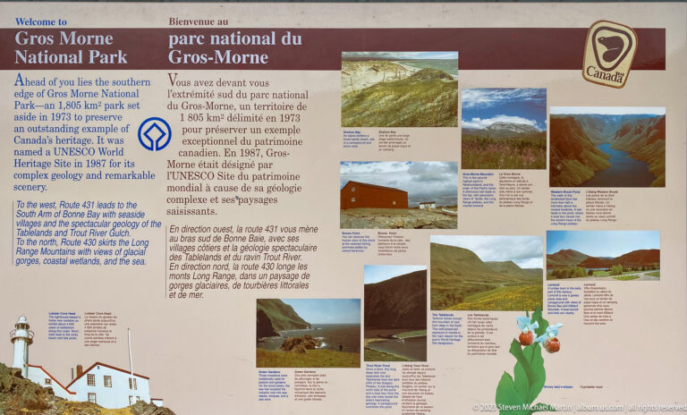 Bilingual Gros Morne National Park interpretive panel about UNESCO World Heritage status with text, photographs, and logos.