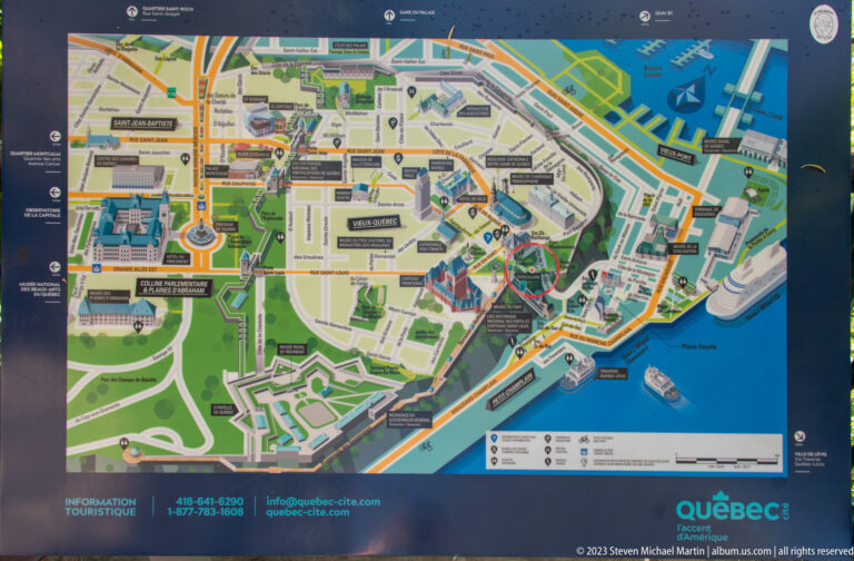 Color tourist map of central Quebec City showing Old Québec, streets, attractions, fortifications, parks, and waterfront areas.