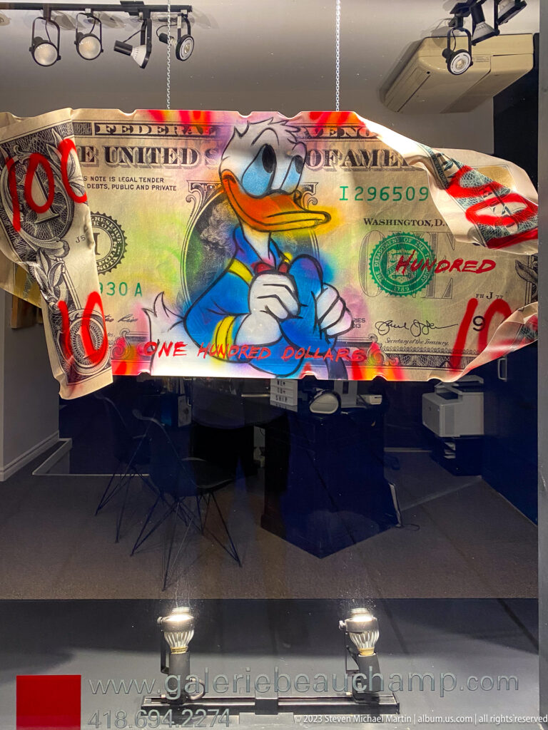Large gallery artwork resembling a U.S. hundred-dollar bill, overpainted with Donald Duck, graffiti marks, words, and bright colors.