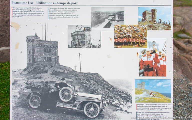 Signal Hill interpretive panel titled Peacetime Use with historic photographs of Cabot Tower, an automobile, and public gatherings.