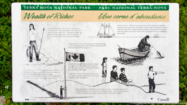 Bilingual interpretive panel with drawings of a sailing boat, fisherman in an open boat, and people fishing from shore.