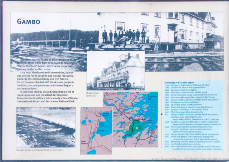 Historical interpretation panel with archival building and group photographs, a regional map, bridge image, and chronology.