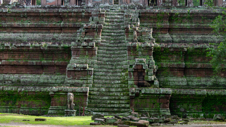 Close centered view up the steep Phimeanakas stair at Angkor Thom.