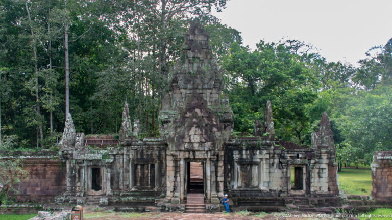 Wider frontal view of towered temple entrance at Angkor Thom.