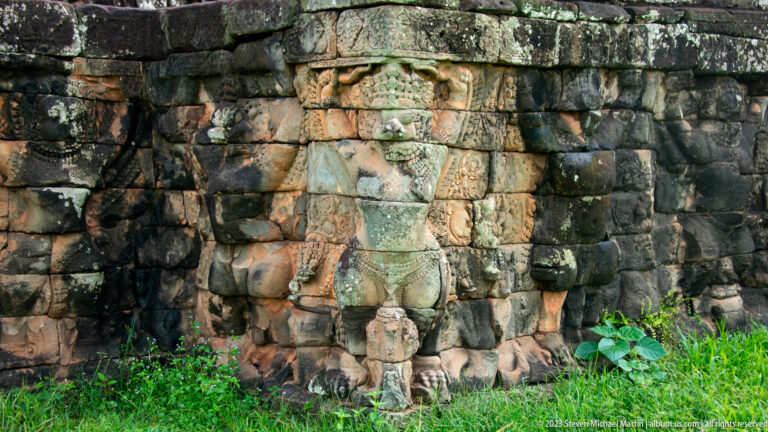 Corner section of elephant terrace with full elephant body at Angkor Thom.