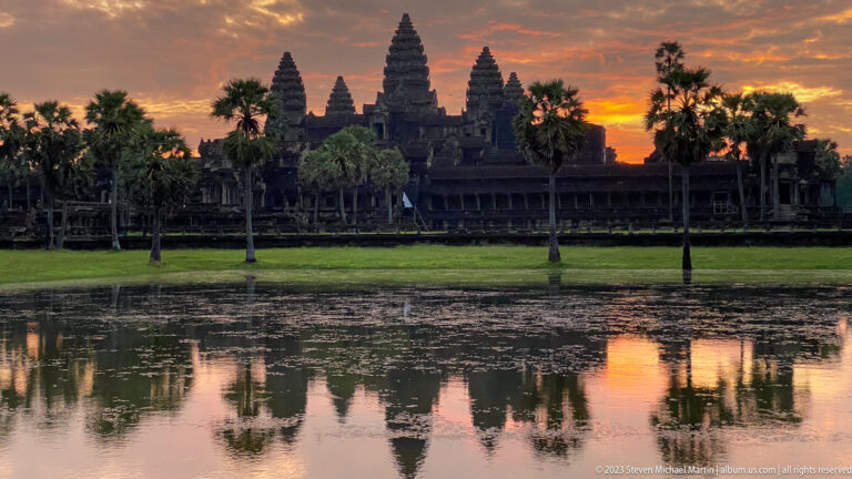 Closer sunset reflection of the tower silhouette in the pool at Angkor Wat.