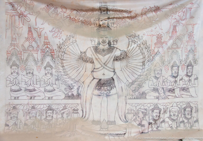 Large line drawing of a central standing figure surrounded by rows of attendants and ornament.
