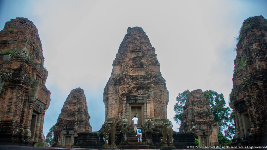 Axial view of principal sanctuary with visitors at East Mebon.