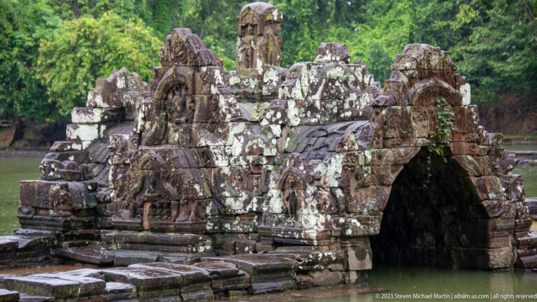 Close view of carved sandstone bridge.