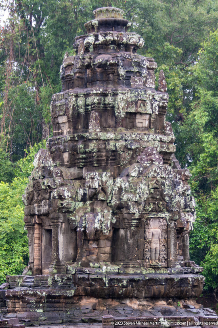 Upper portion of sandstone temple tower.