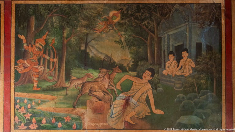 Temple mural of a fallen man near water as richly dressed figures approach through a forest.