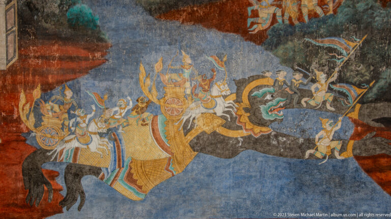 Reamker mural battle scene with mounted warriors, attendants, weapons, and a dark serpent-like form.