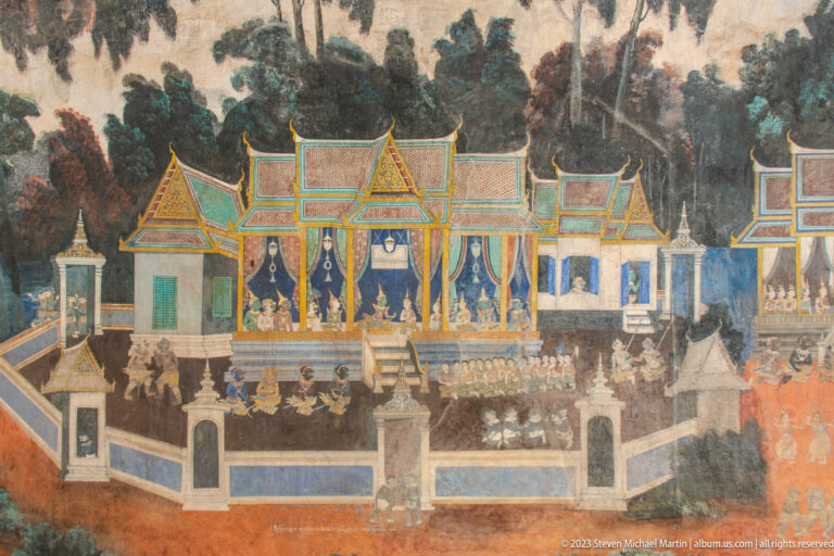 Reamker mural showing seated court figures in an open pavilion surrounded by attendants and guards.