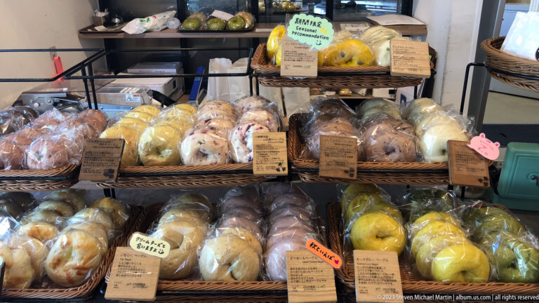 Bakery shelves with packaged breads in its surrounding Kyoto setting.