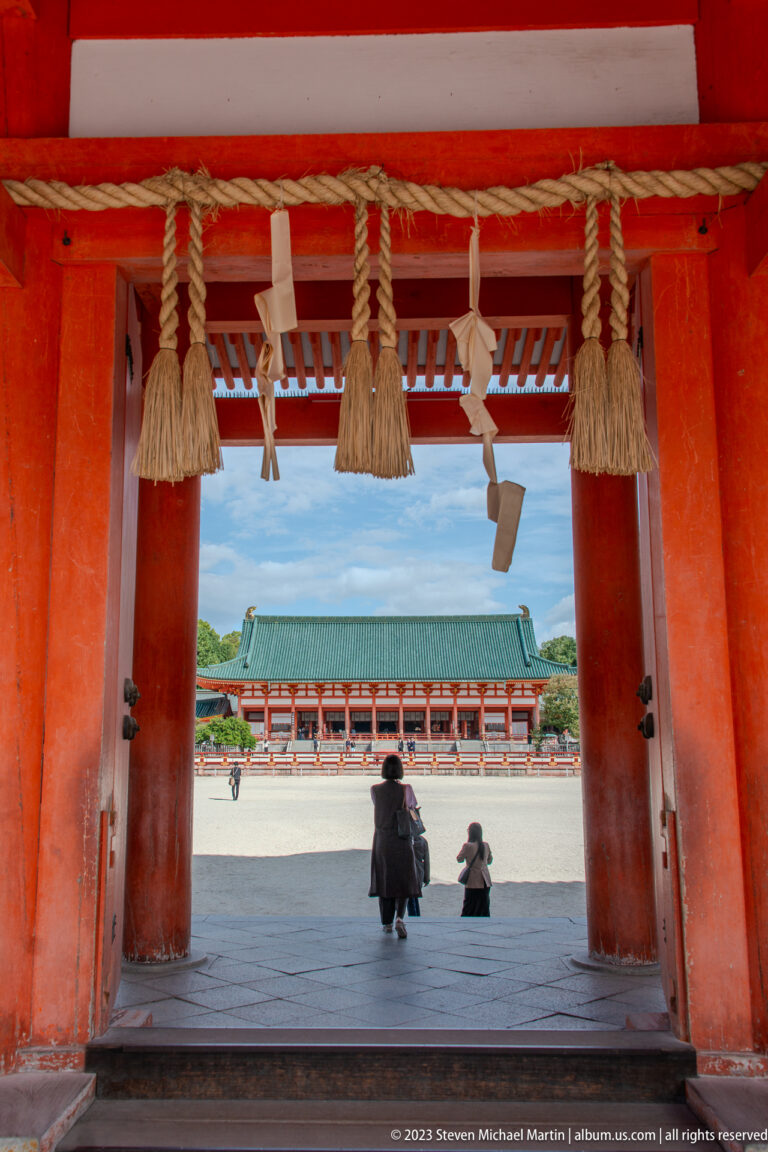 View through Heian Jingu’s Otenmon gate toward the shrine courtyard and distant hall.