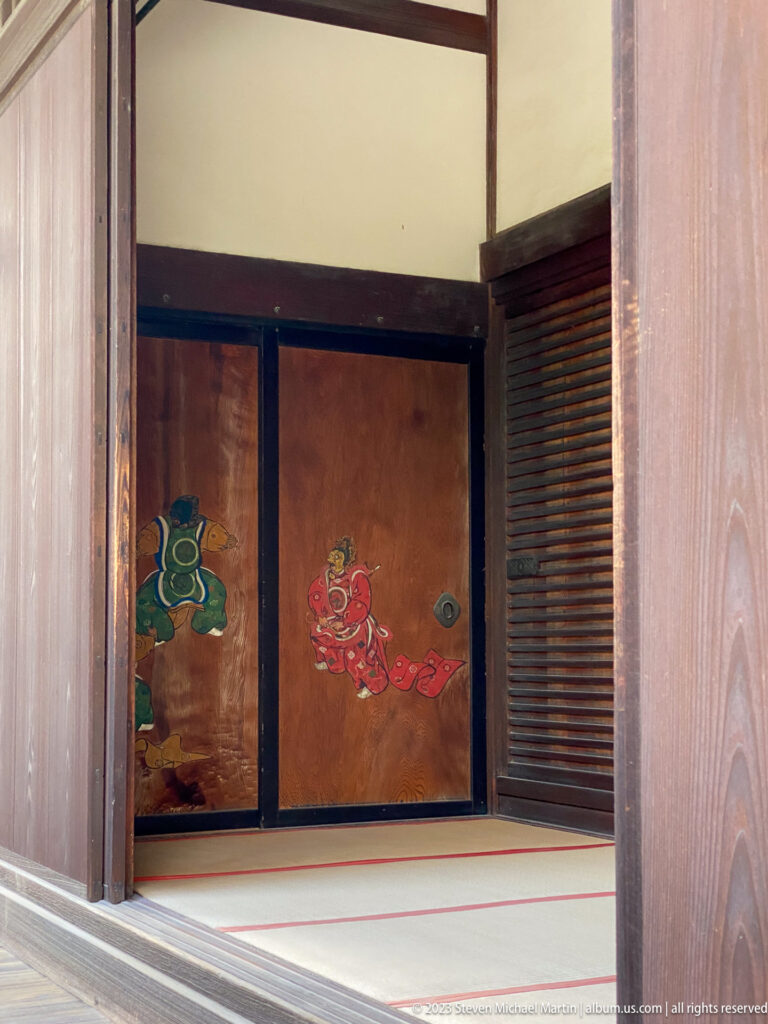 Landscape painted across multiple sliding fusuma panels.