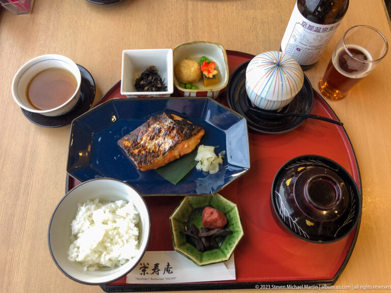 Traditional Japanese set meal with grilled fish, rice and soup.