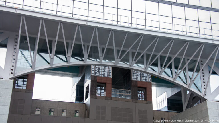 Elevated bridge with exposed steel framing.