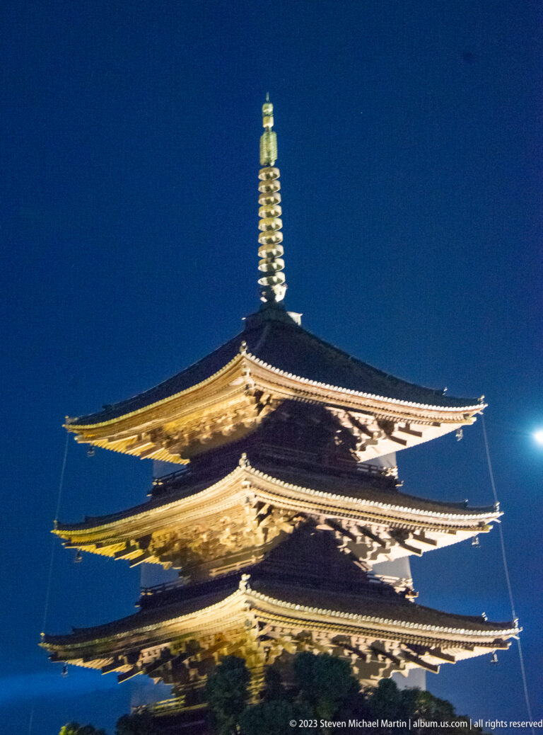 Five-story pagoda of Tō-ji Temple in Kyoto shown at night with the principal architectural, landscape, or street details visible in the composition.