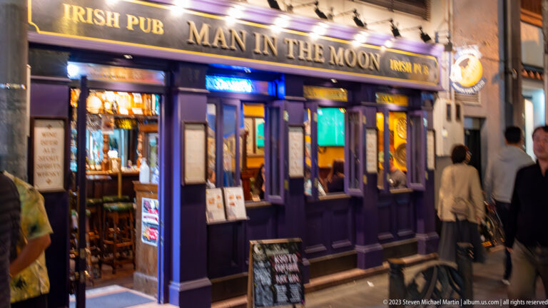 Man in the Moon pub exterior shown at night with the principal architectural, landscape, or street details visible in the composition.