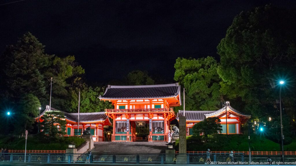 Illuminated Yasaka Shrine gate at night shown at night with the principal architectural, landscape, or street details visible in the composition.
