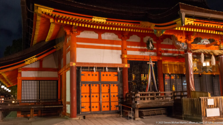 Main Yasaka Shrine building shown at night with the principal architectural, landscape, or street details visible in the composition.