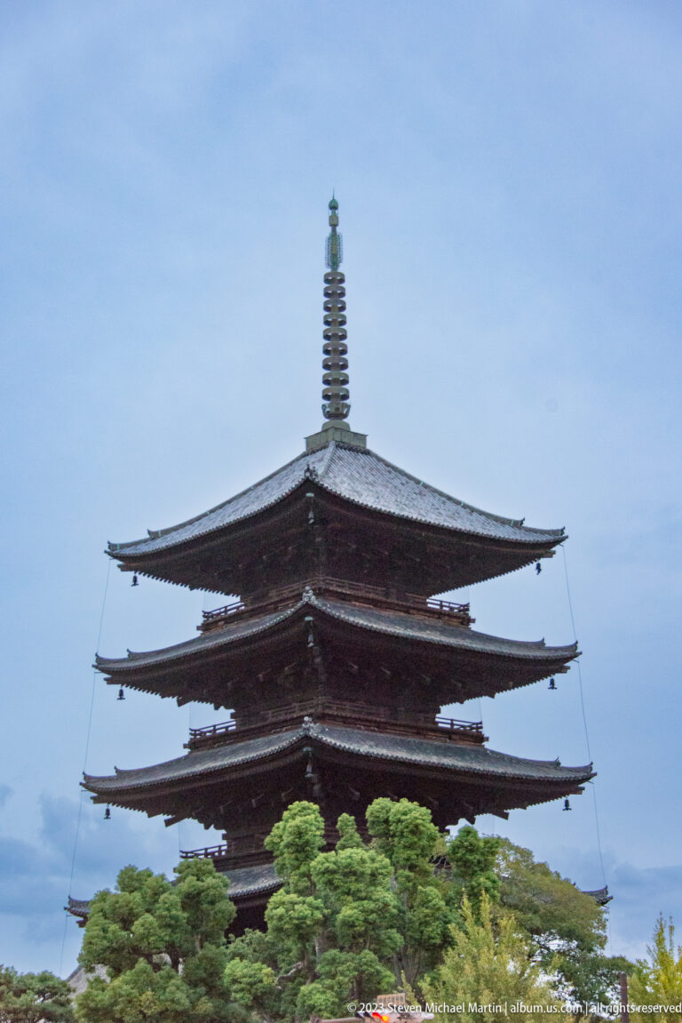 Five-story pagoda of Tō-ji Temple in Kyoto shown at night with the principal architectural, landscape, or street details visible in the composition.