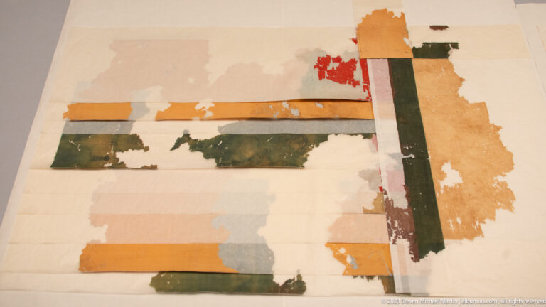Fragmentary mounted work with faded green, orange, red, and pale blue strips on a light ground.