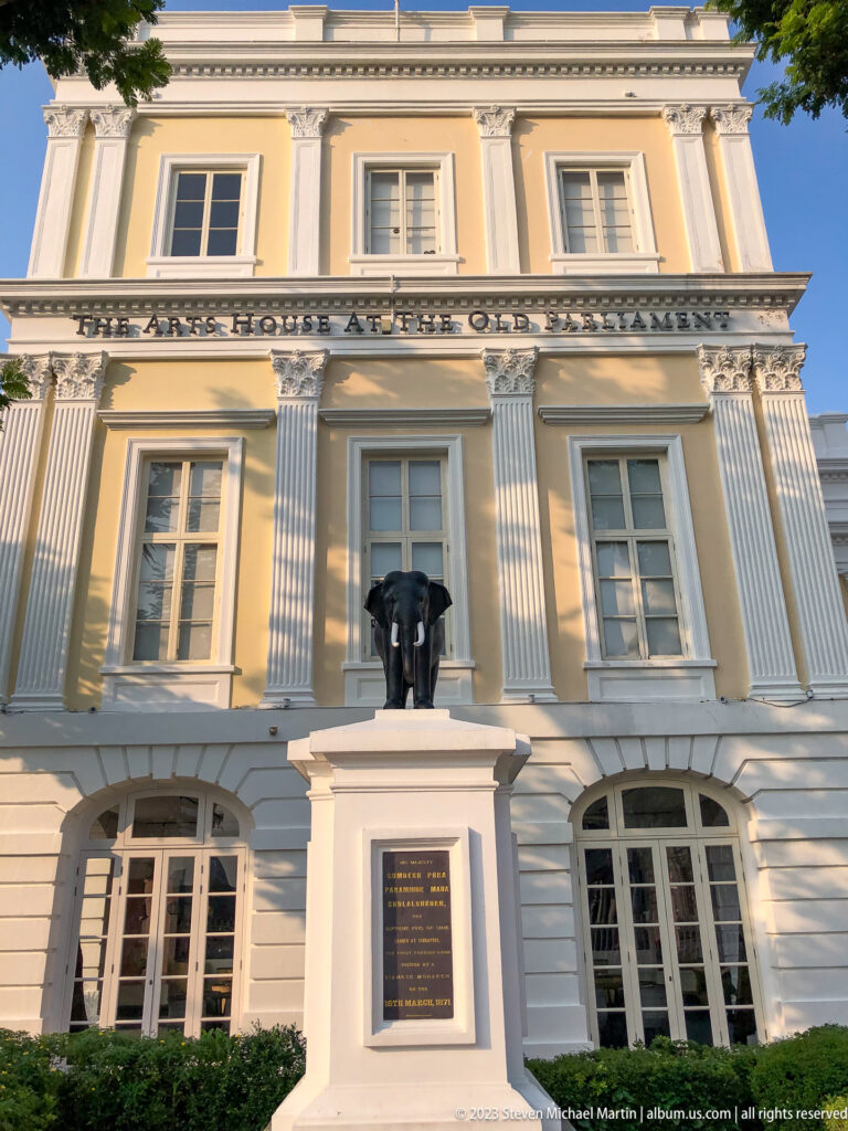 Asian Civilisations Museum façade with black elephant sculpture on a white plinth.