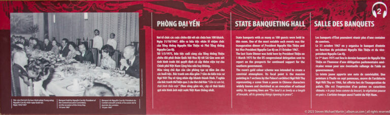Red multilingual museum panel titled State Banqueting Hall with a black-and-white banquet photograph.