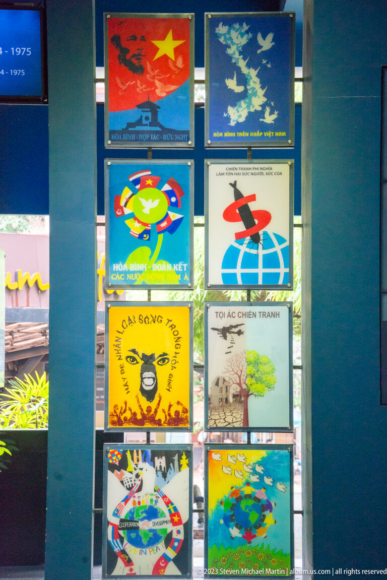 Grid of colorful international posters supporting Vietnam and peace.