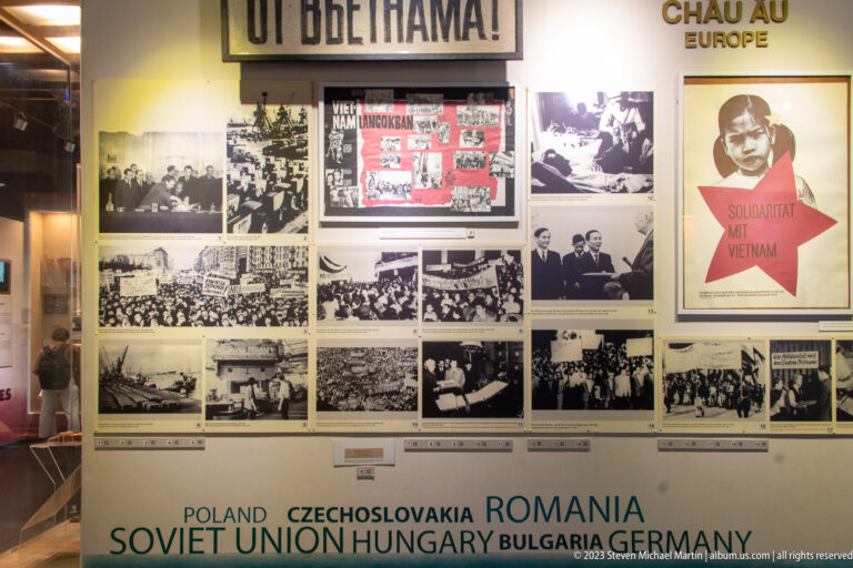 European antiwar display with archival photographs, posters, and country names.