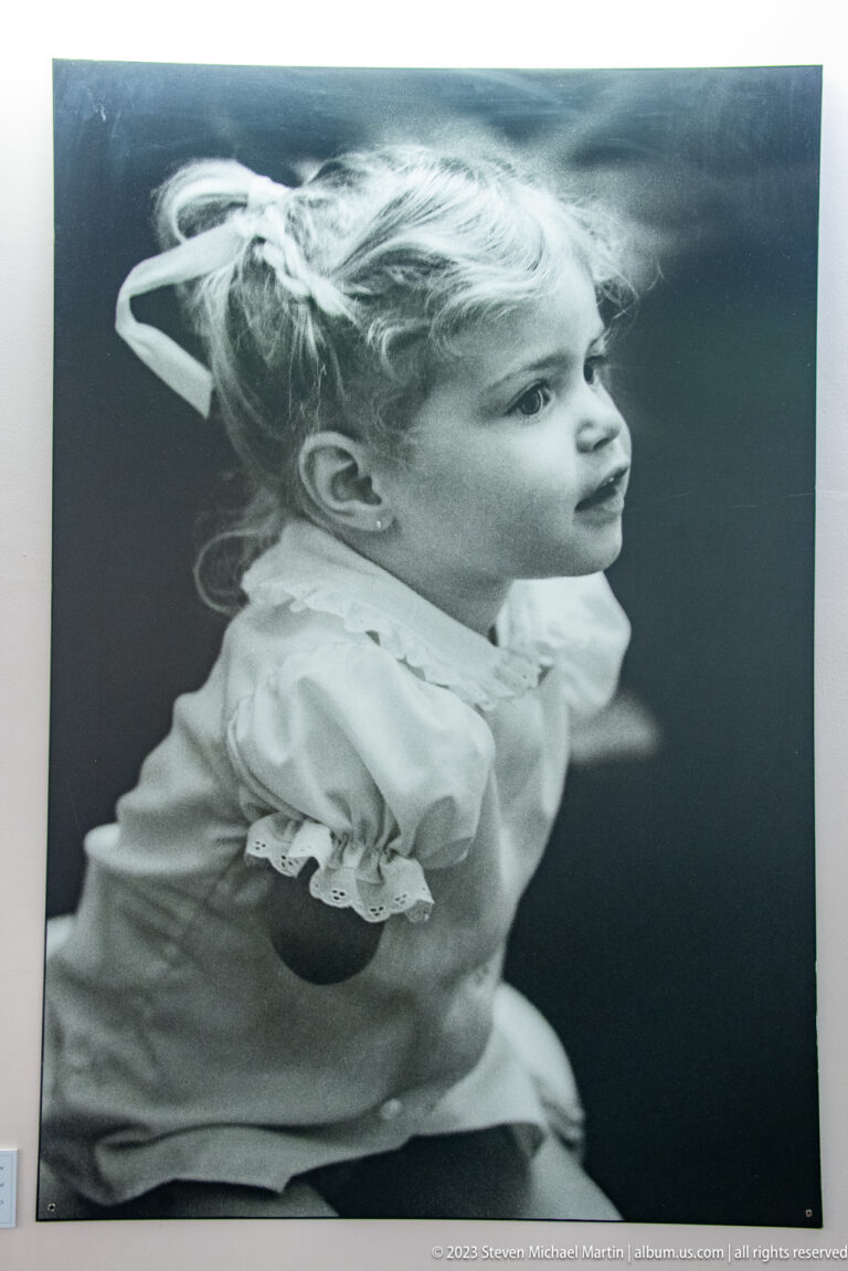 Black-and-white profile portrait of a young girl.