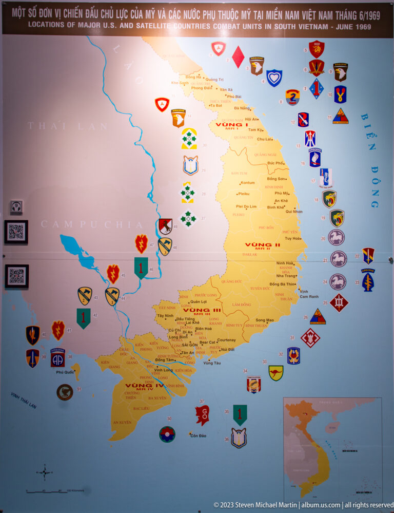 Map of South Vietnam covered with U.S. military unit insignia and symbols.