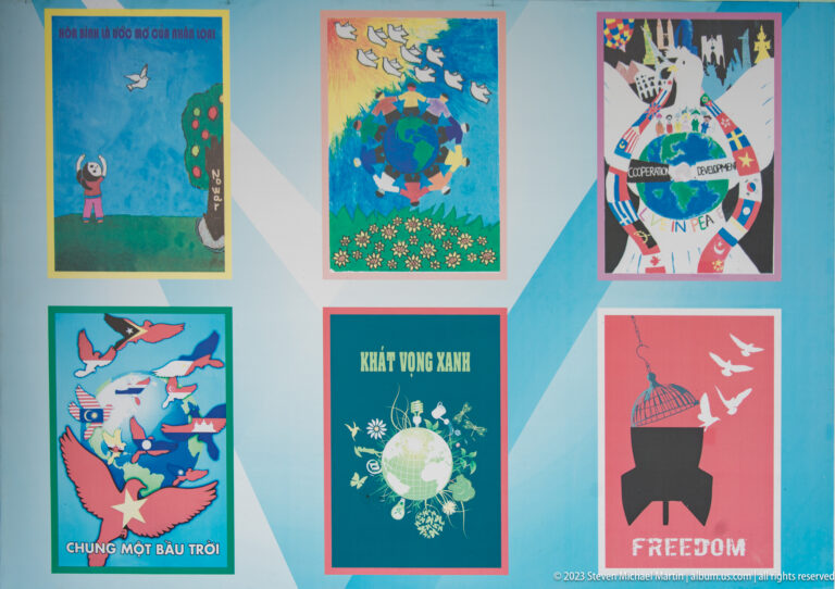 Six colorful peace posters with doves, globes, flowers, and the word Freedom.