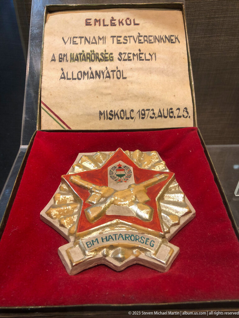 Star-shaped emblem in a presentation case with a Hungarian inscription dated 1973.