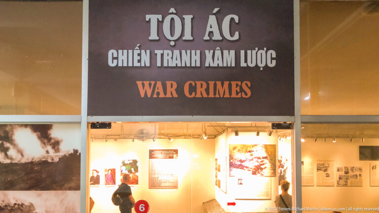 Entrance to the War Crimes gallery with bilingual signage above.