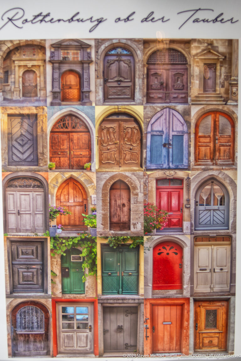 Poster collage showing dozens of historic Rothenburg doors in varied shapes, materials, and colors.