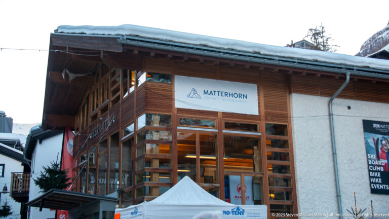Timber-and-glass building with a large MATTERHORN sign, snow on the roof, and a white canopy in front.
