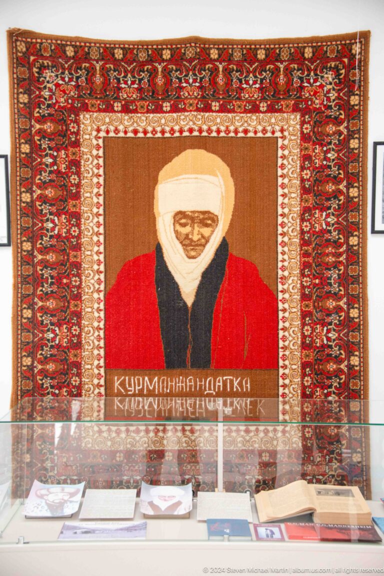 Woven portrait tapestry of an elderly man.