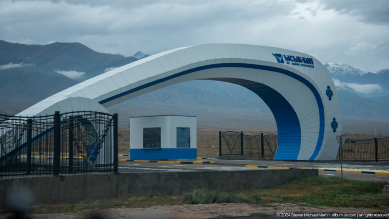 White-and-blue arched modern building.