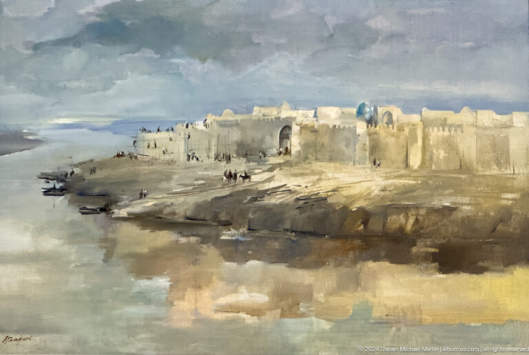 Pale walled settlement under gray sky beside reflective shoreline.