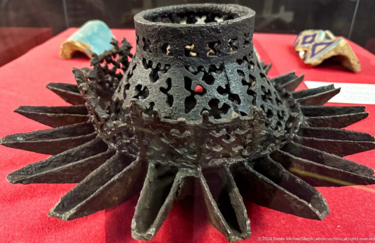 Openwork metal vessel with radial spikes on display in the Central State Museum in Almaty, Kazakhstan.