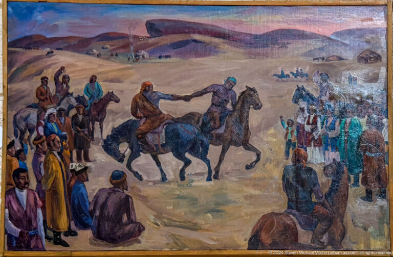 Medium view of a historical battle or migration painting on display at the Central State Museum in Almaty, Kazakhstan.