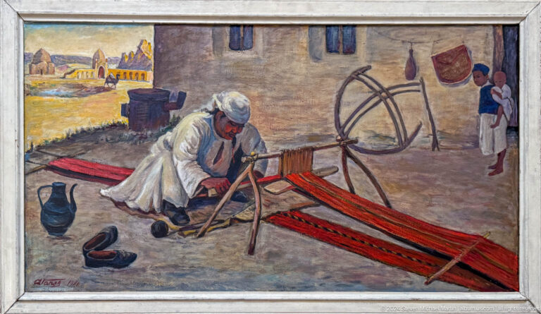 Medium view of a traditional craft painting showing an artisan working at a textile frame, in the Central State Museum of Kazakhstan in Almaty.